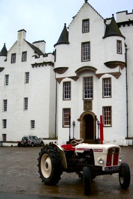 tractor outside statley home